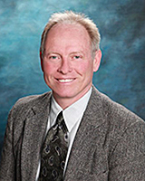 Dr. James Abel
